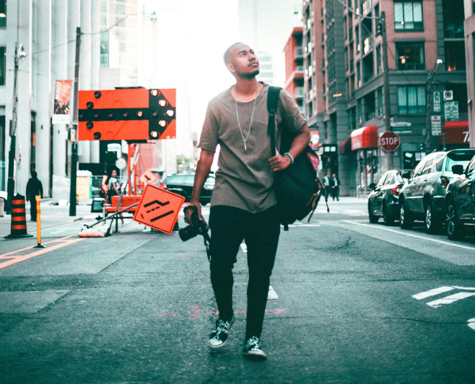 man walking down street in Toronto