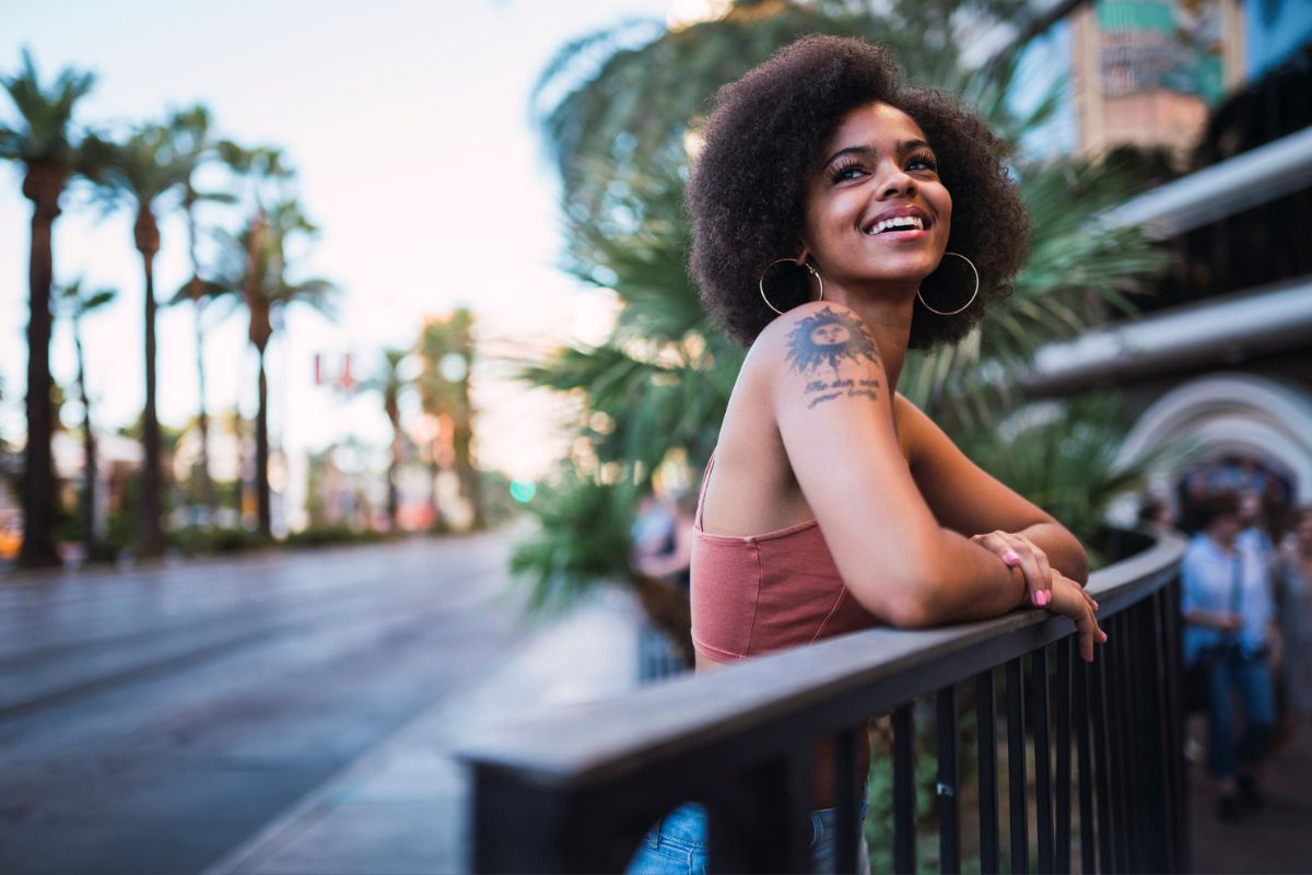 happy woman smiling standing new Las Vegas strip