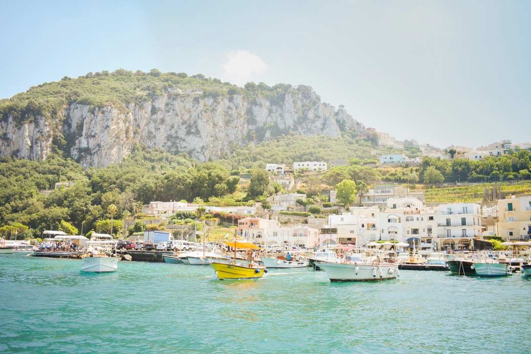 Capri is a small island but it was a significant filming destination for the Netflix series "Ripley". 
pictured: a bright day on the coast of Capri