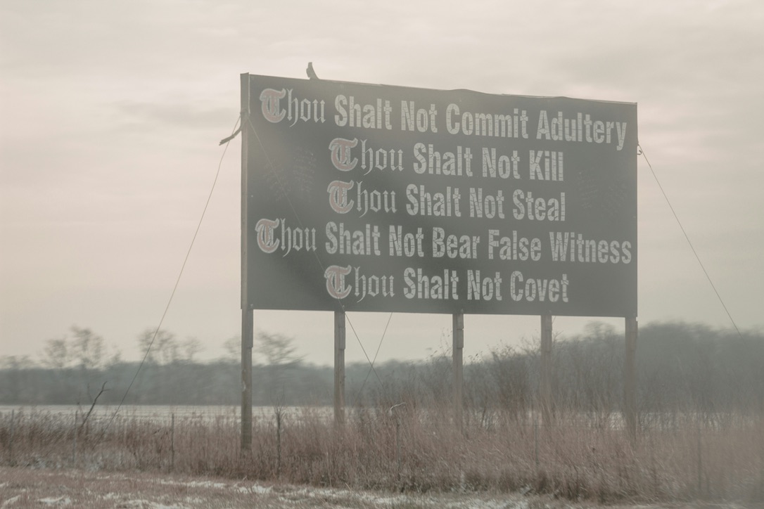 Check out the various places where "The Ten Commandments" were filmed. pictured: a sign on a mysterious road that lists some of the ten commandments