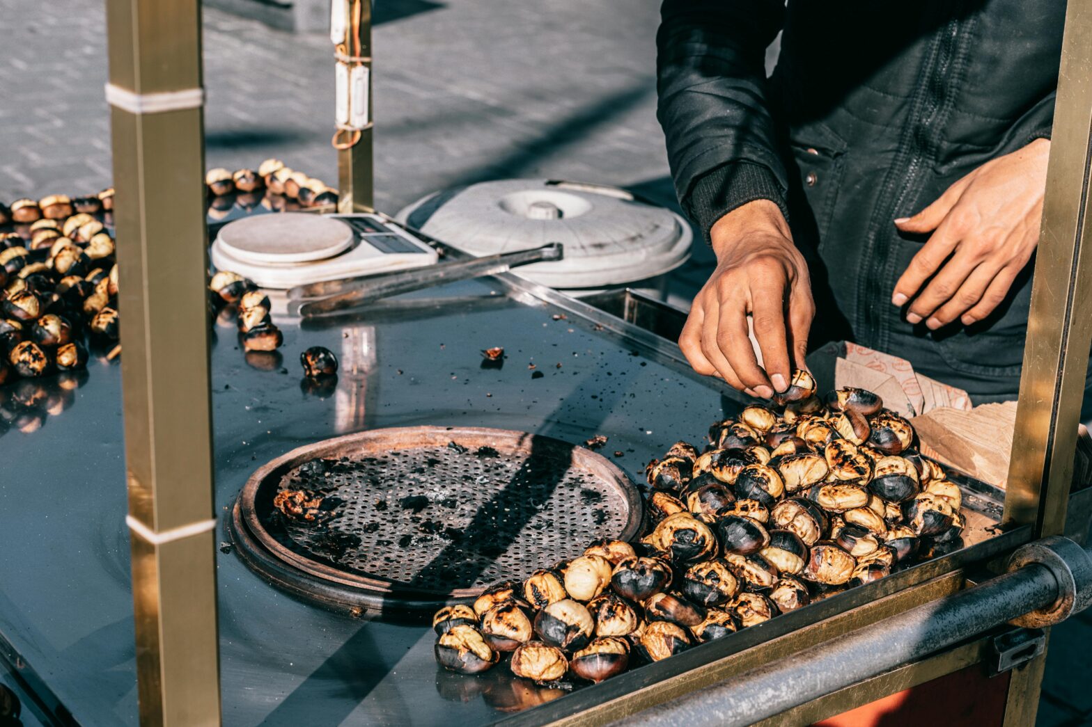 man preparing food outdoors