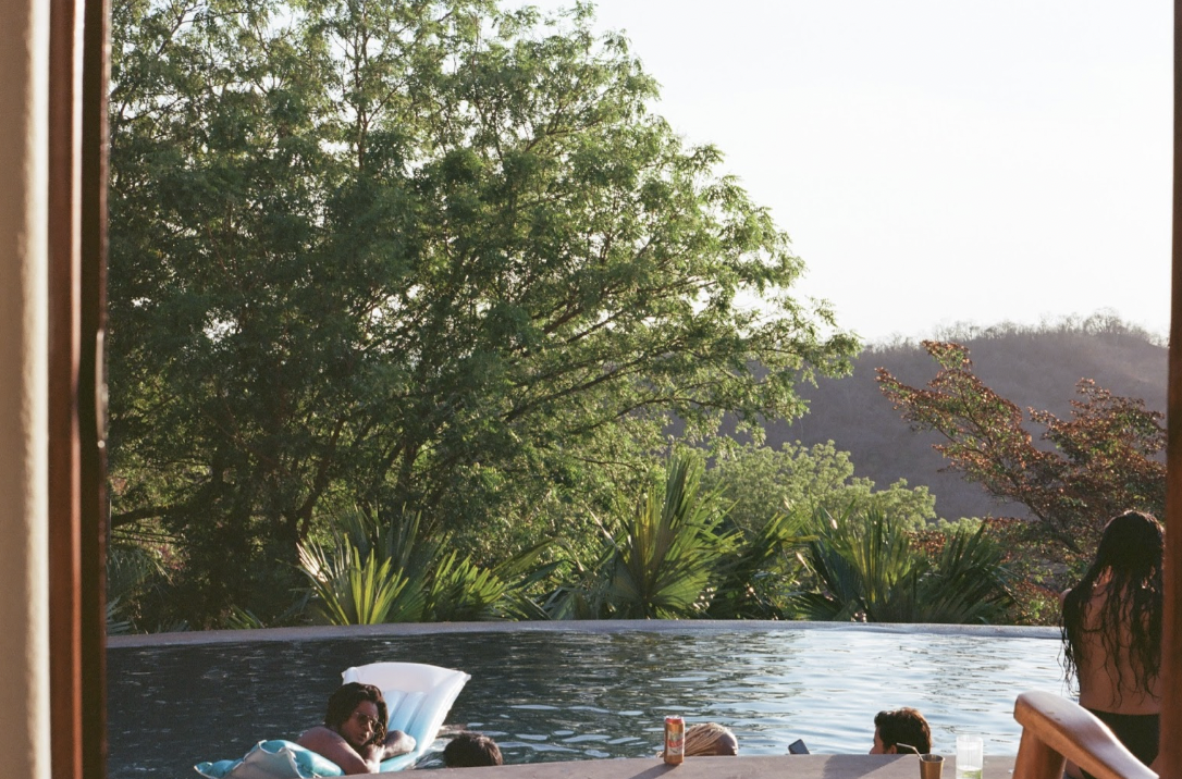 people in infinity pool at Apogeo Guest House in Nicaragua