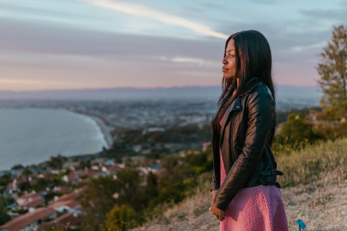 Woman in Black Leather Jacket Looking Away