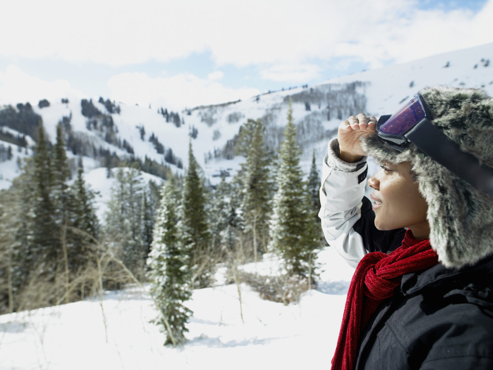 Woman shielding eyes in snow in Salt Lake City, Utah