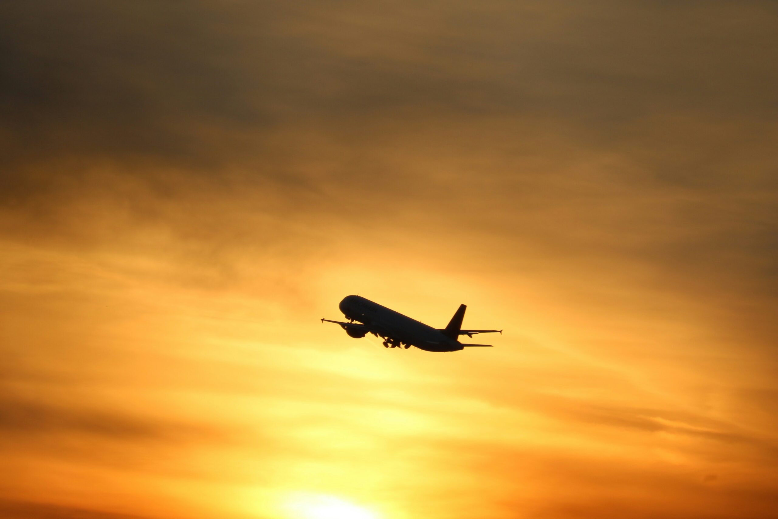 Learn more about Real ID.
Pictured: an airplane during sunset