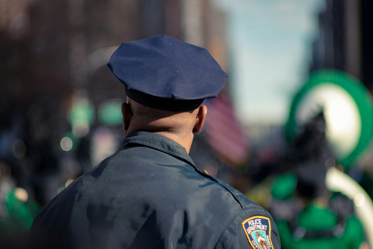 Back view of a police officer on the street