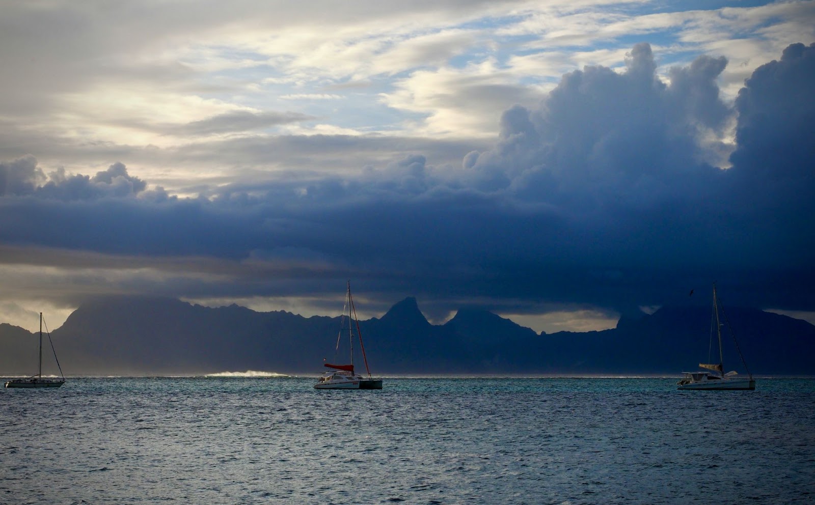 Boat tours are a popular activity for tourist in Tahiti. 
pictured: boats on the water of Tahiti