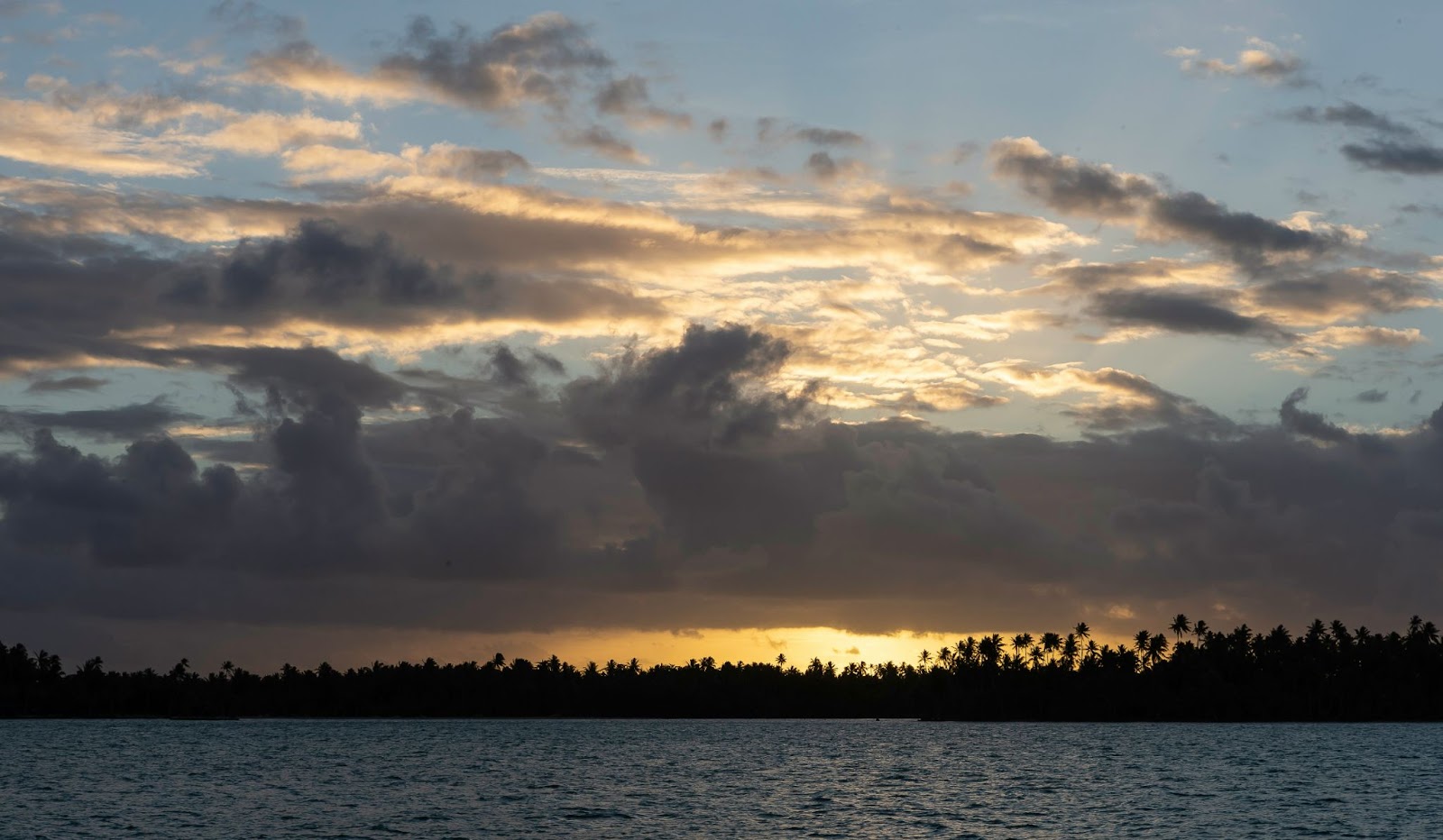 The weather is one of the reasons that June is the best time to visit Tahiti. 
pictured: the sunset in Tahiti