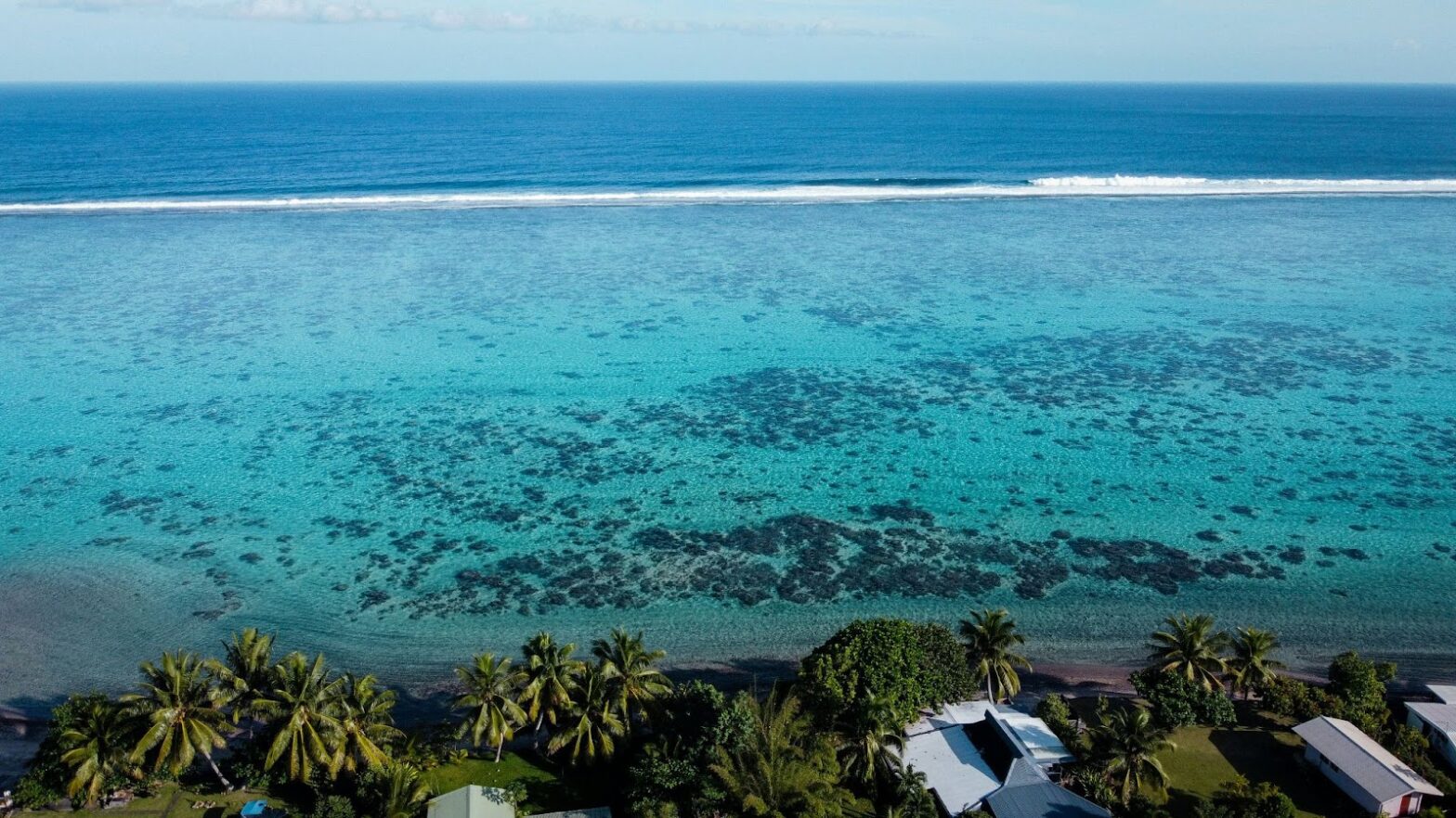 These are the top eight reasons that travelers should visit Tahiti in June. pictured: an aerial view of Tahiti