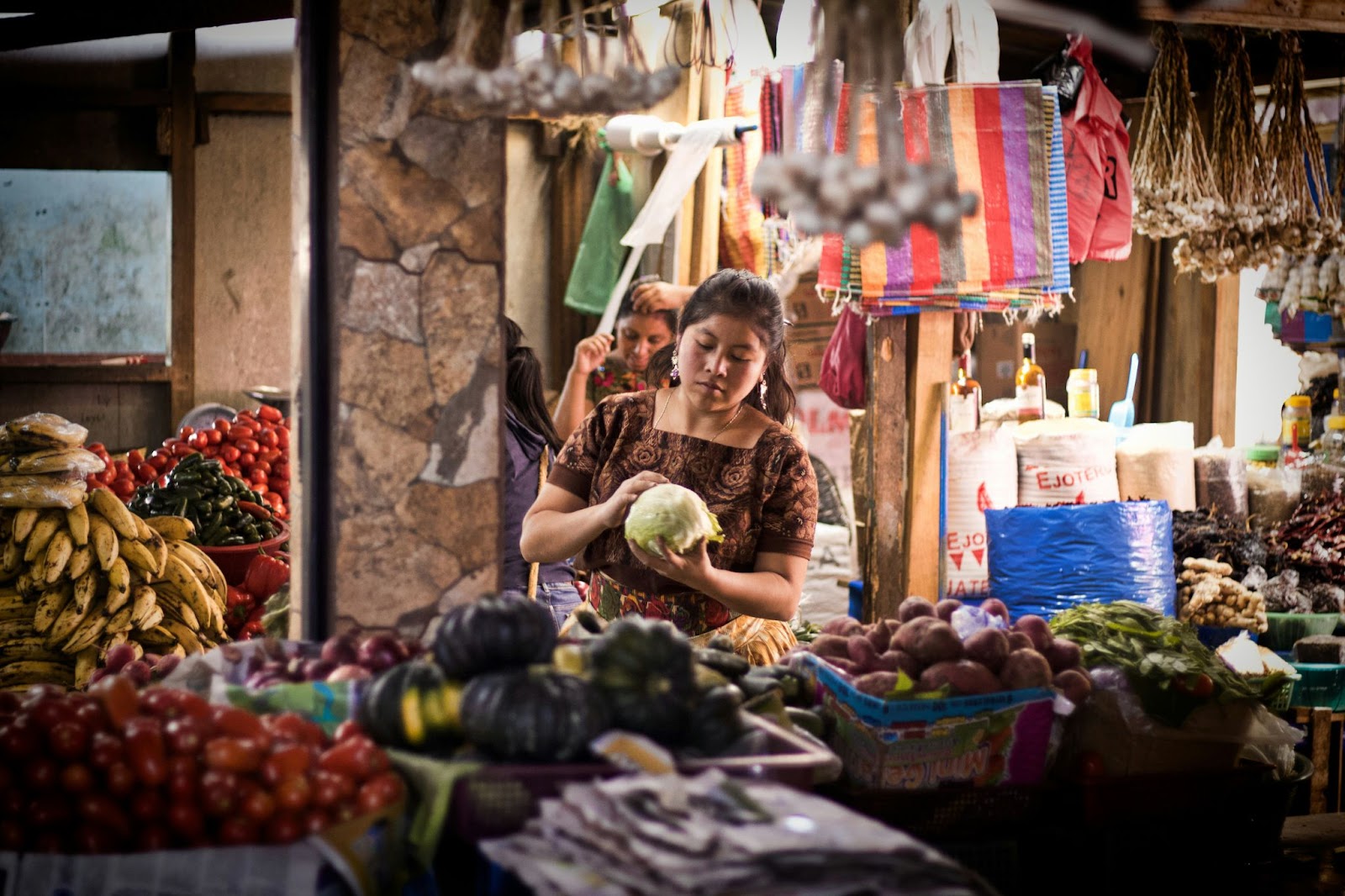 There are many cultural festivals in Guatemala during the dry season. These festivals are the reason that the dry season is the best time to visit Guatemala.
pictured: a Guatemalan woman at the market