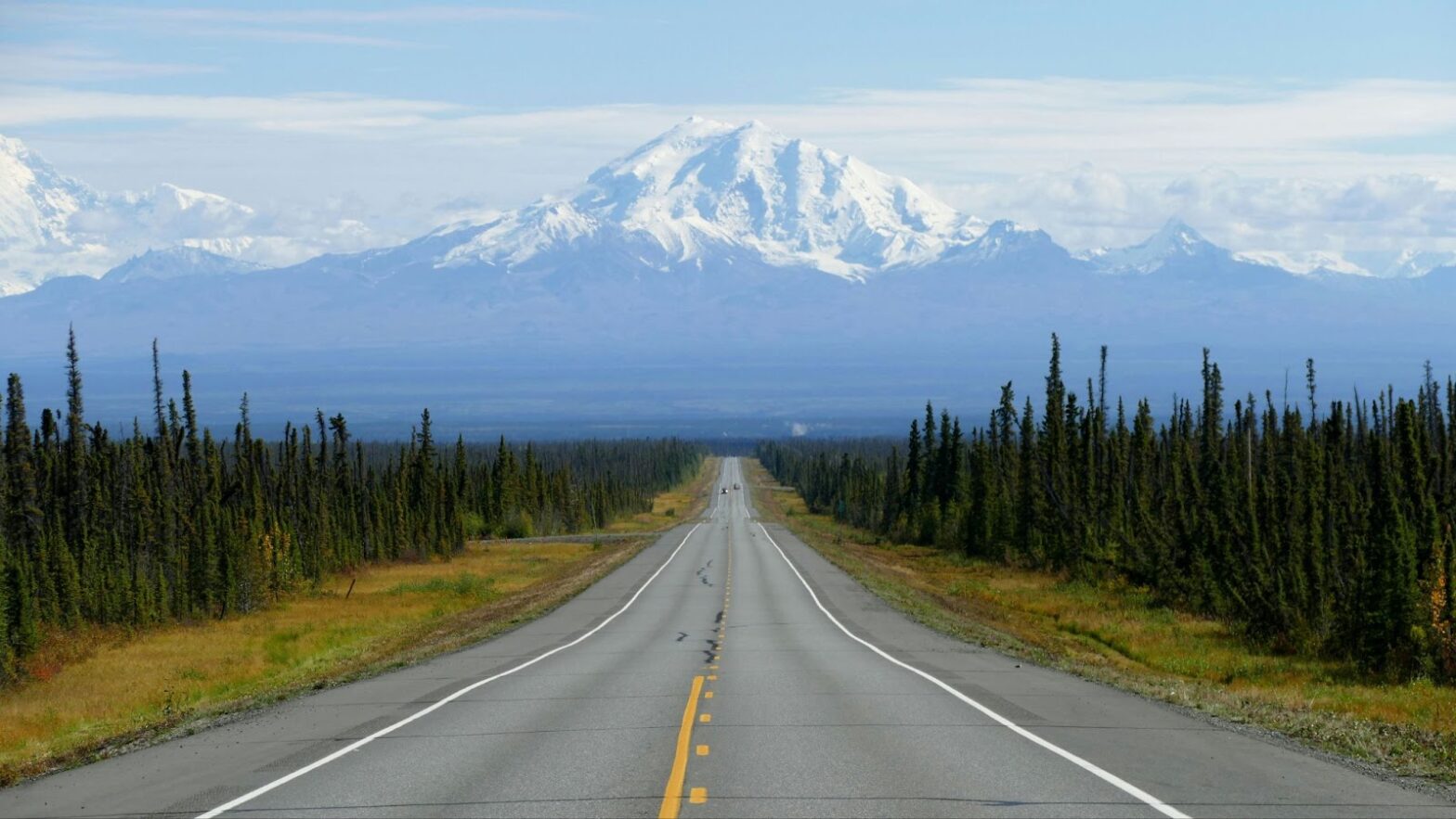 The open road of Alaska during the warm season.