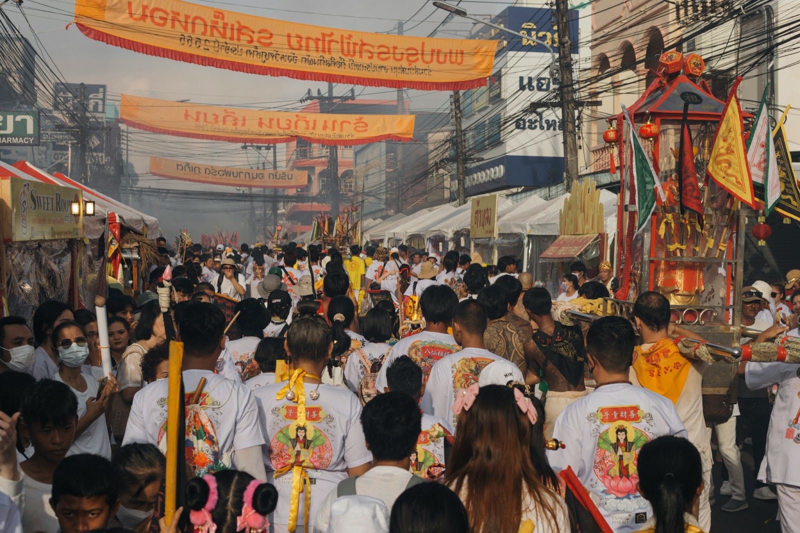 The cultural events during dry season in Thailand make it one of the best times to visit. 
pictured: the streets of Thailand during a festival 