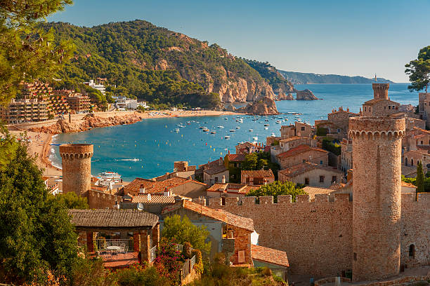 where was under paris filmed Pictured: Aerial view of Fortress Vila Vella and Badia de Tossa bay at summer in Tossa de Mar on Costa Brava, Catalunya, Spain