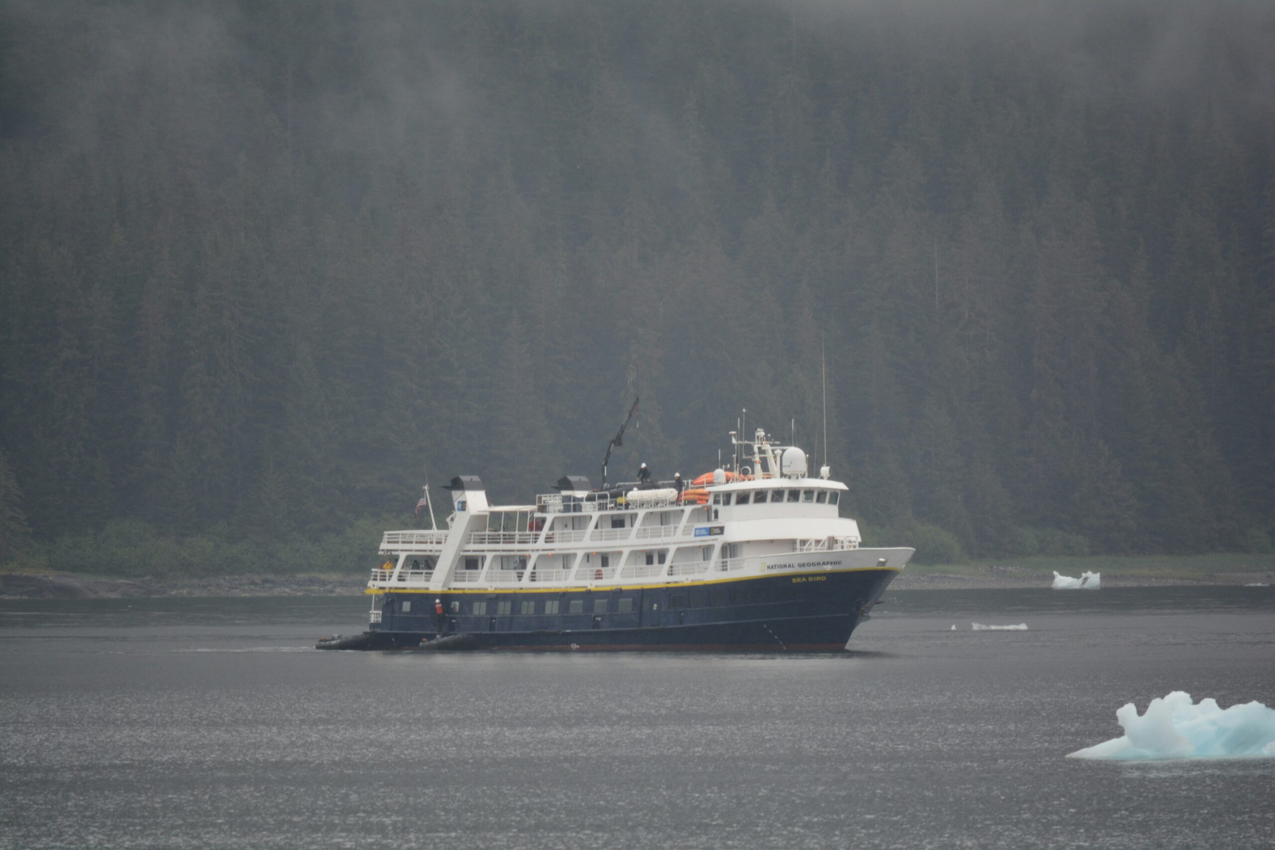 There are plenty of day cruises that travelers can take in June during their visit to Alaska. 
pictured: a boat on the water in Alaska