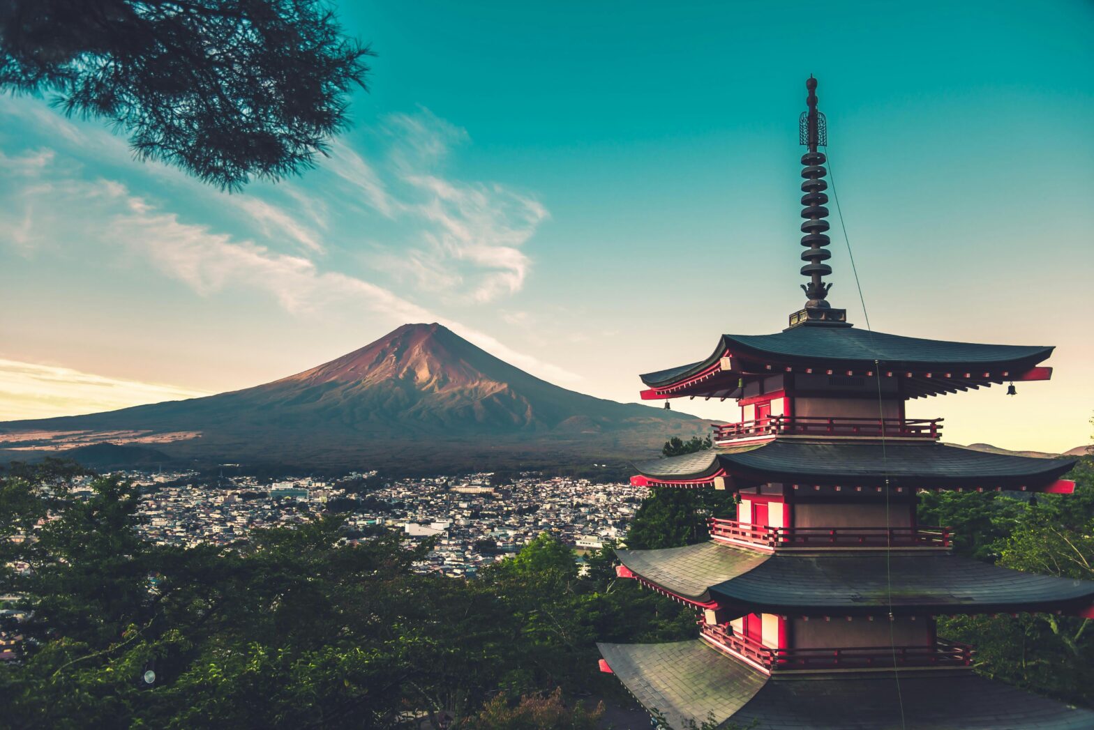 Check out why a Japanese town is putting up barriers around Mount Fuji. pictured: overlooking a town near Mount Fuji