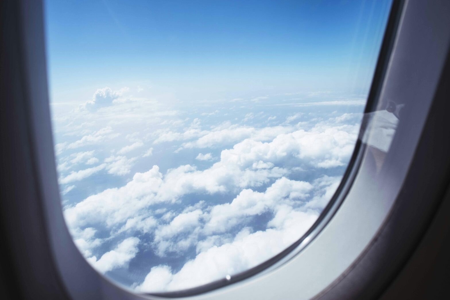 Looking out an airplane window.