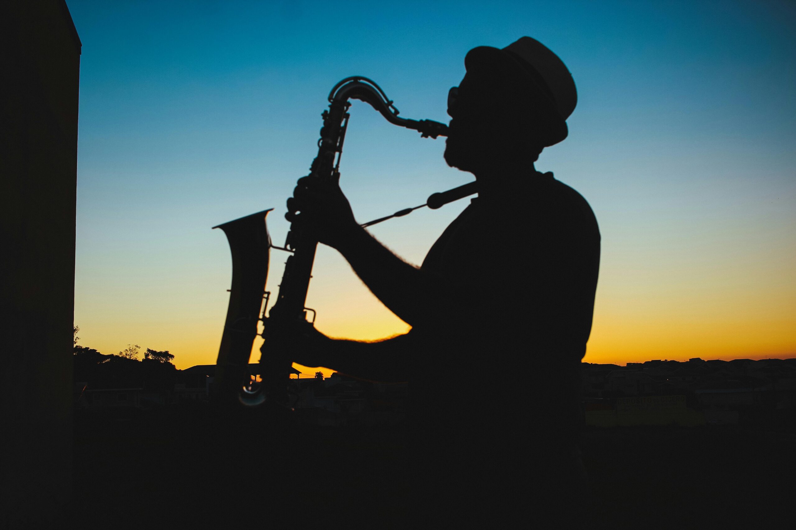 This jazz fest is something that travelers can do during their visit to Tahiti in June. pictured: a man playing jazz in a tropical destination