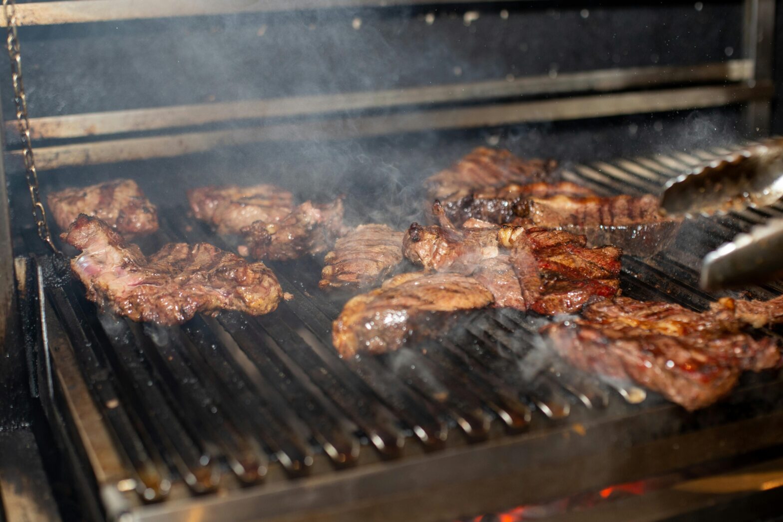 Meat cooking on a grill.