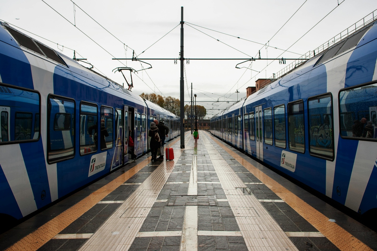 View of Passenger Trains at the Station on Both Sides of a Platform