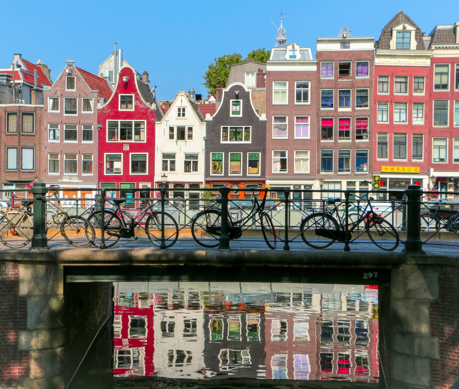 Travelers should bike while in Amsterdam. Pictured: bikes in Amsterdam