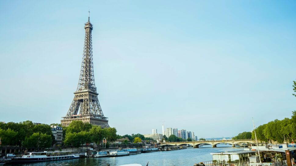 Travelers visiting Paris during July should sunbathe. pictured: the Seine on a summer day