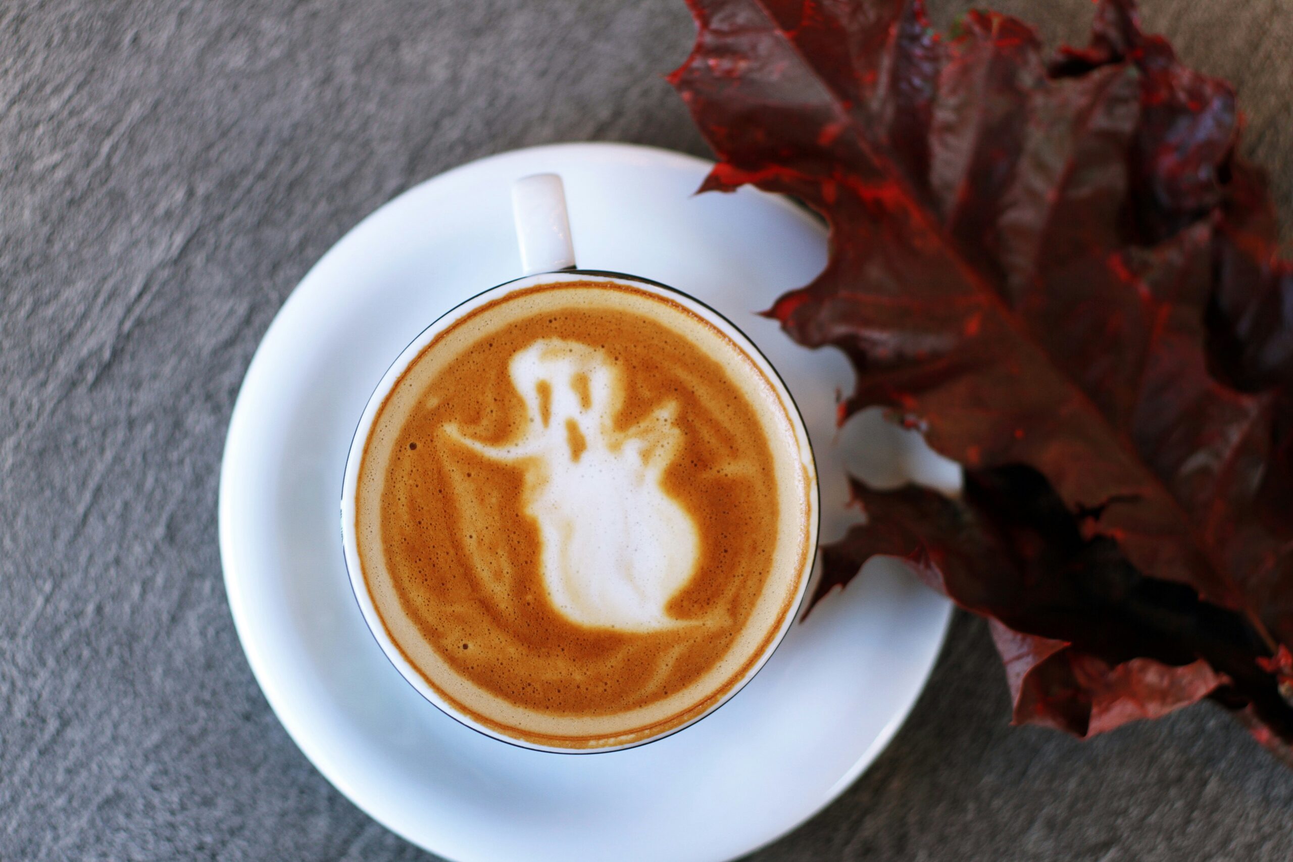 The Halloween holiday is one reason that fall is the best time to visit NYC.
Pictured: cappuccino with Halloween decor