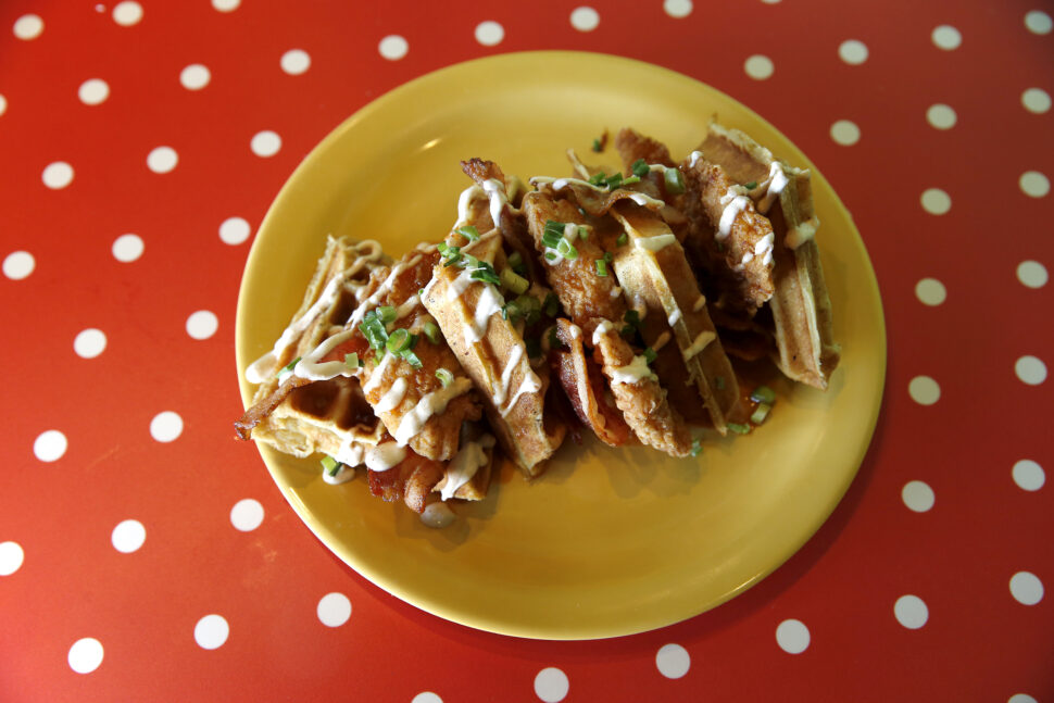 Best Restaurants in Boston pictured: chicken and waffles from The Friendly Toast