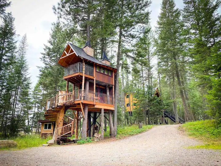 This treehouse retreat is great for travelers. 
Pictured: tall treehouse  