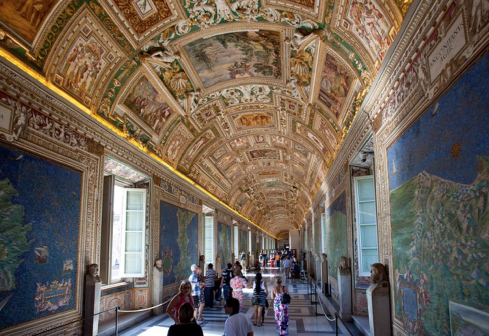 hallway view of the centuries old artwork in the Vatican in Rome, Italy