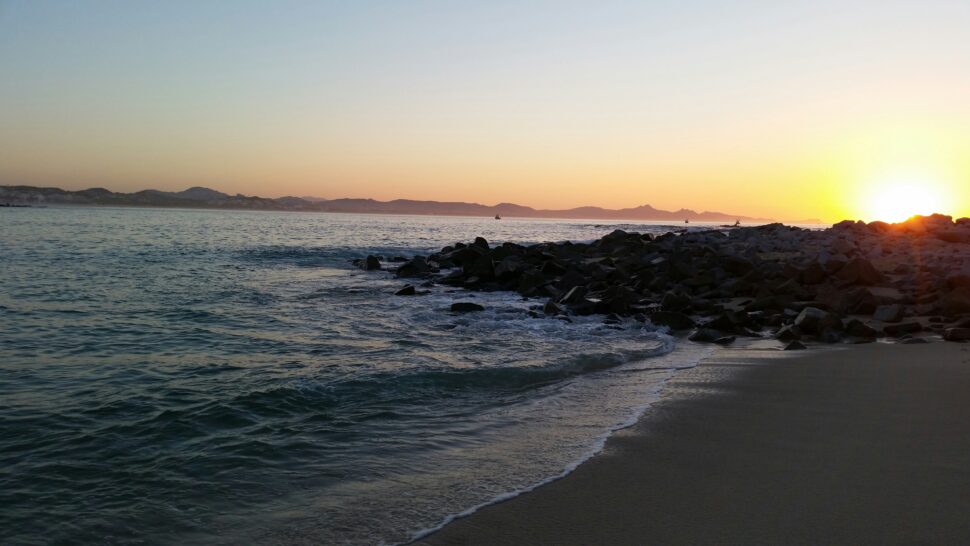 beach shoreline at sunrise