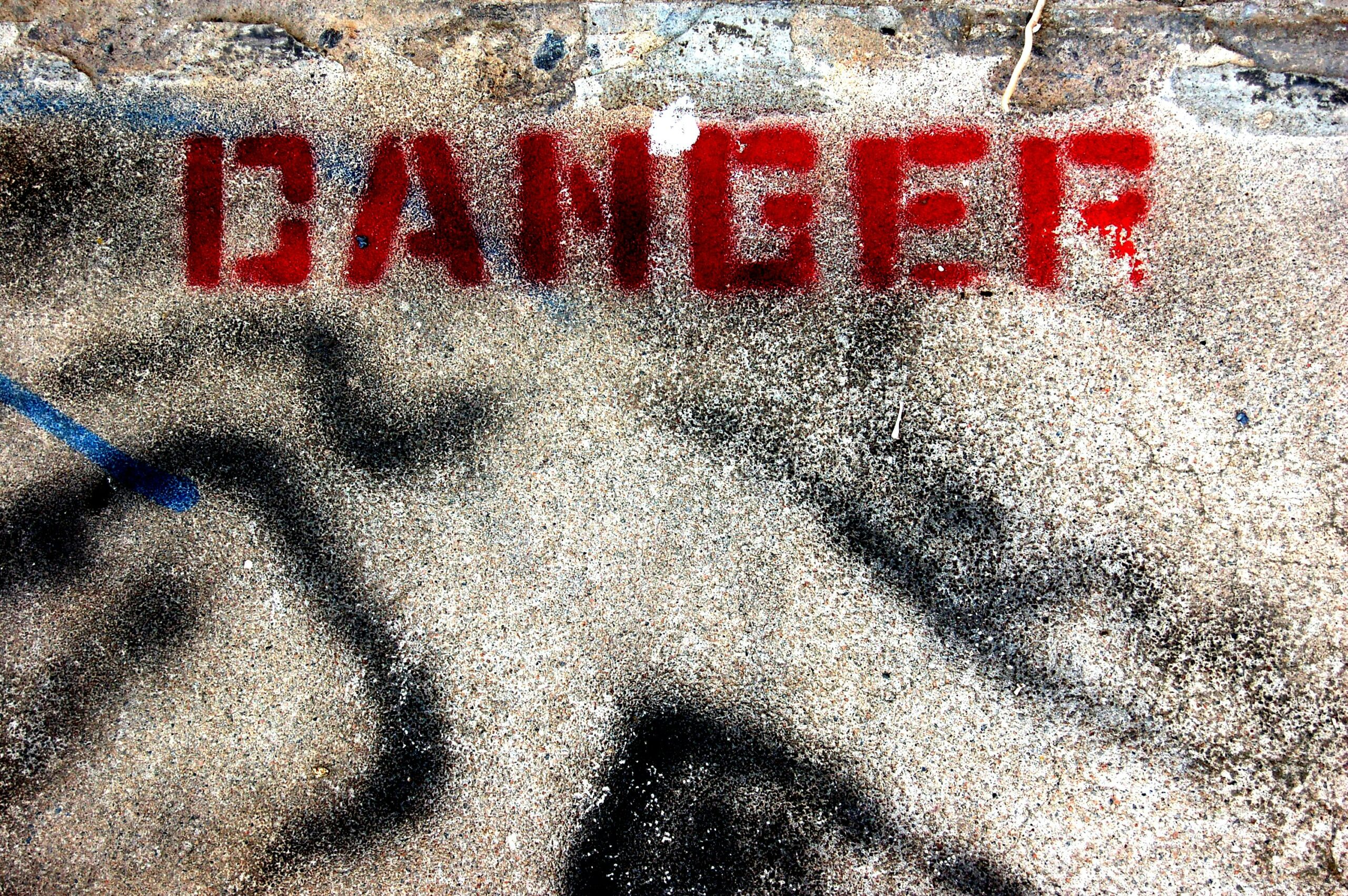 This is what travelers should know about the travel warning for Jamaica.
pictured: danger graffiti
