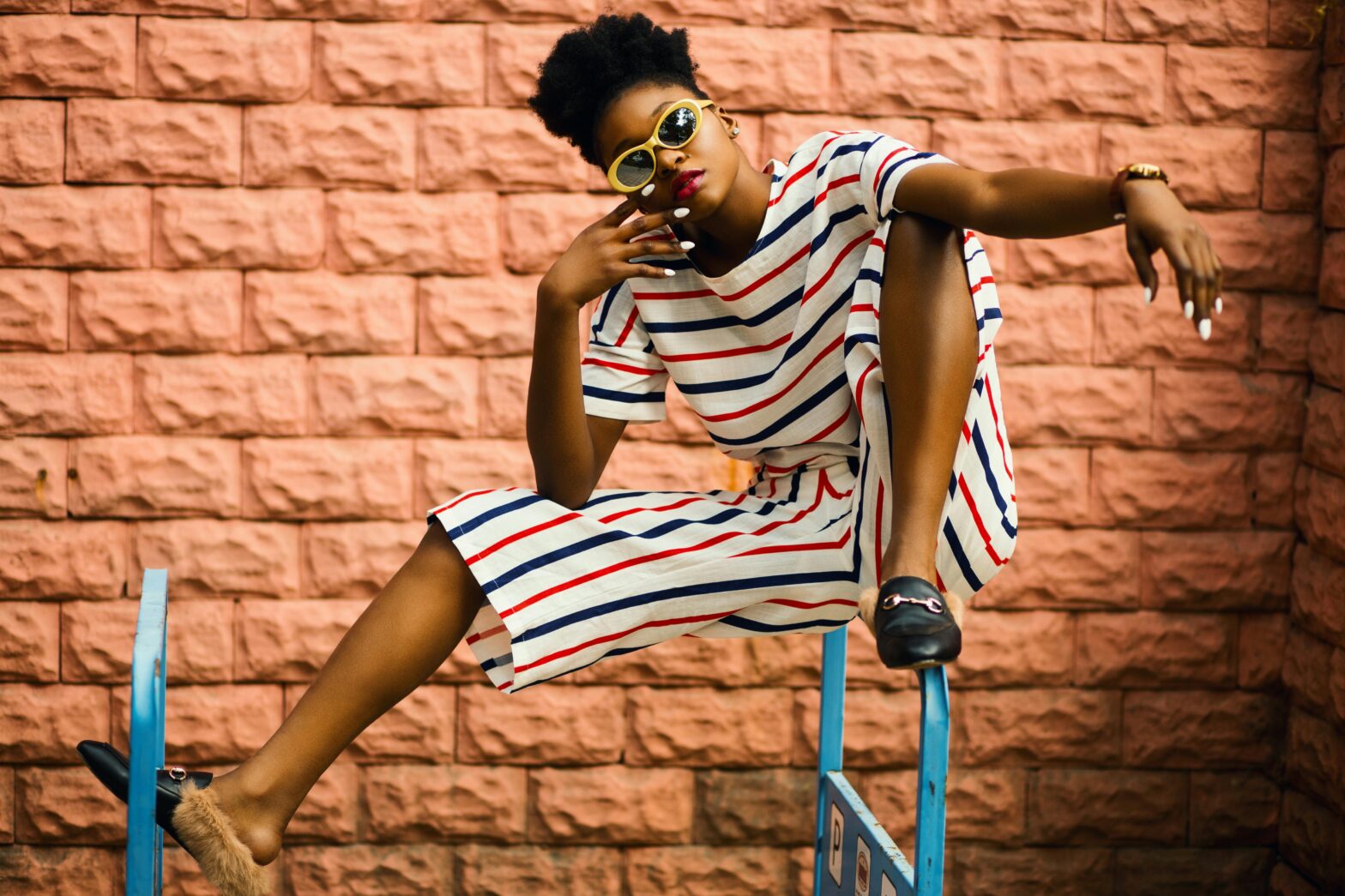 woman posing in stylish clothing set