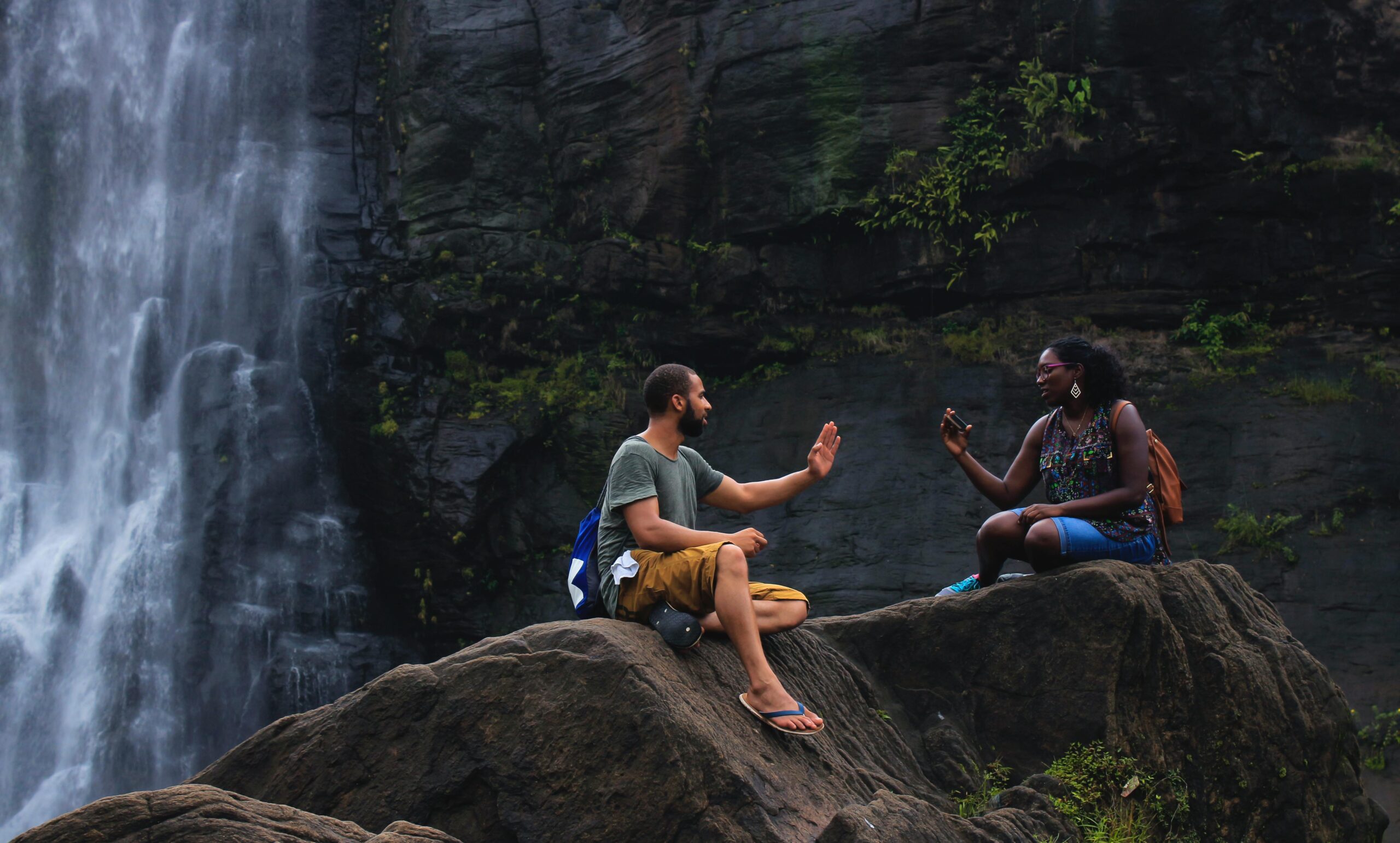 These are the top five underrated national parks that travelers should visit. 
pictured: two Black people enjoying naure