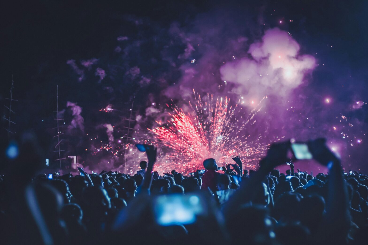 crowd of people at outdoor festival at night