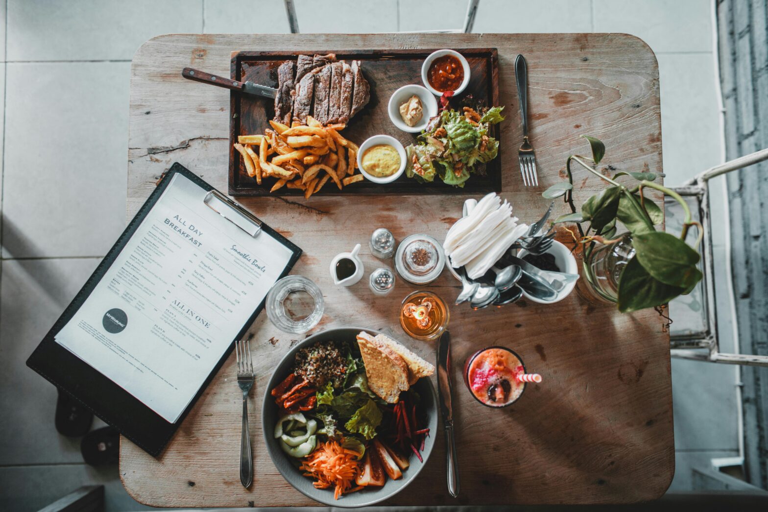 aerial view of restaurant table with several food dishes