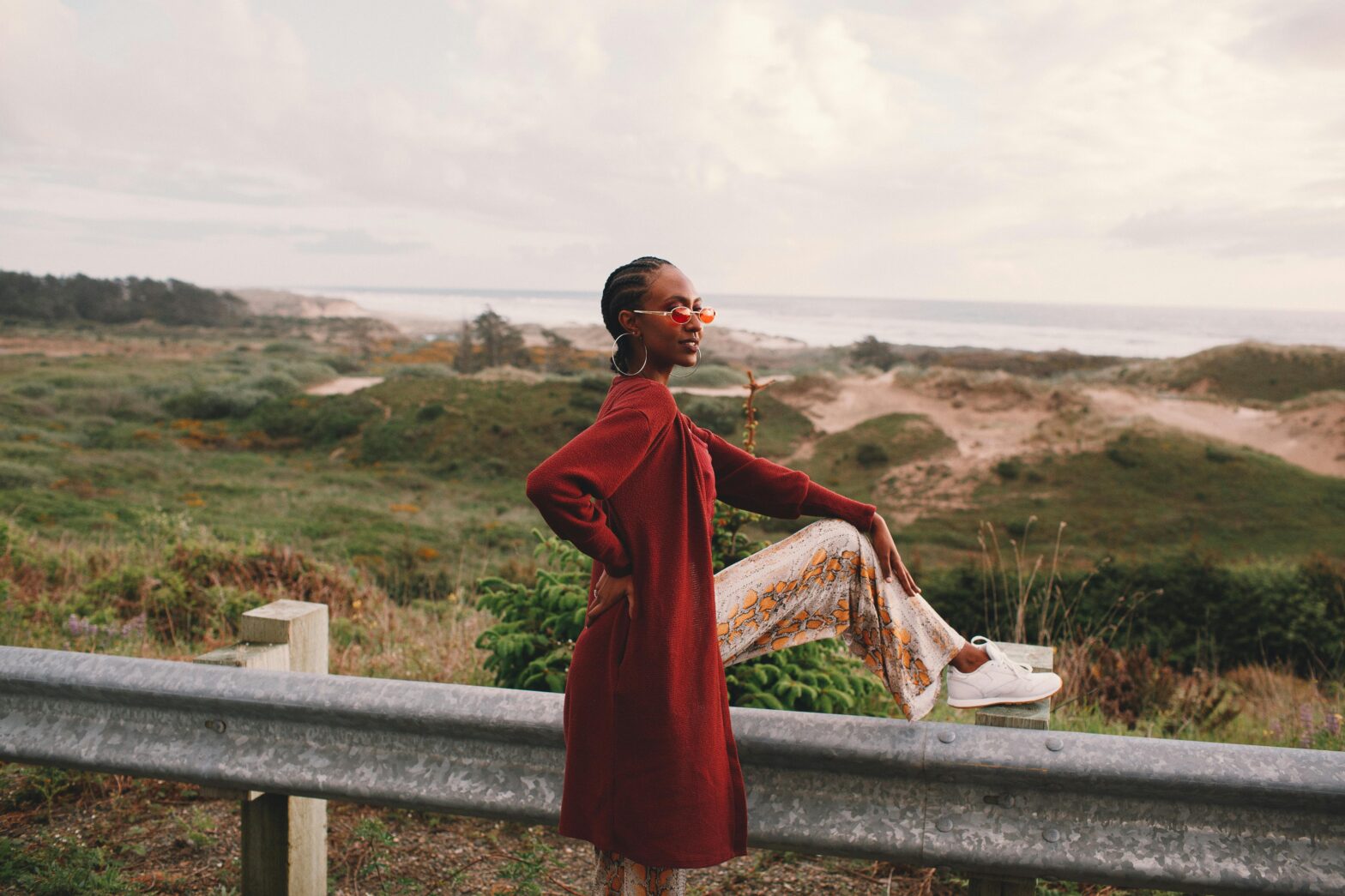 Woman on the side of the road.