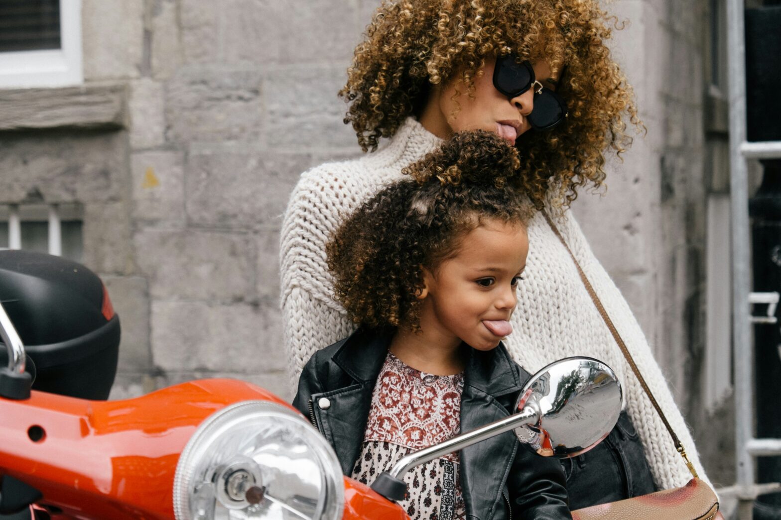 These are the top Amazon devices for kids. pictured: Black mom and daughter travelling