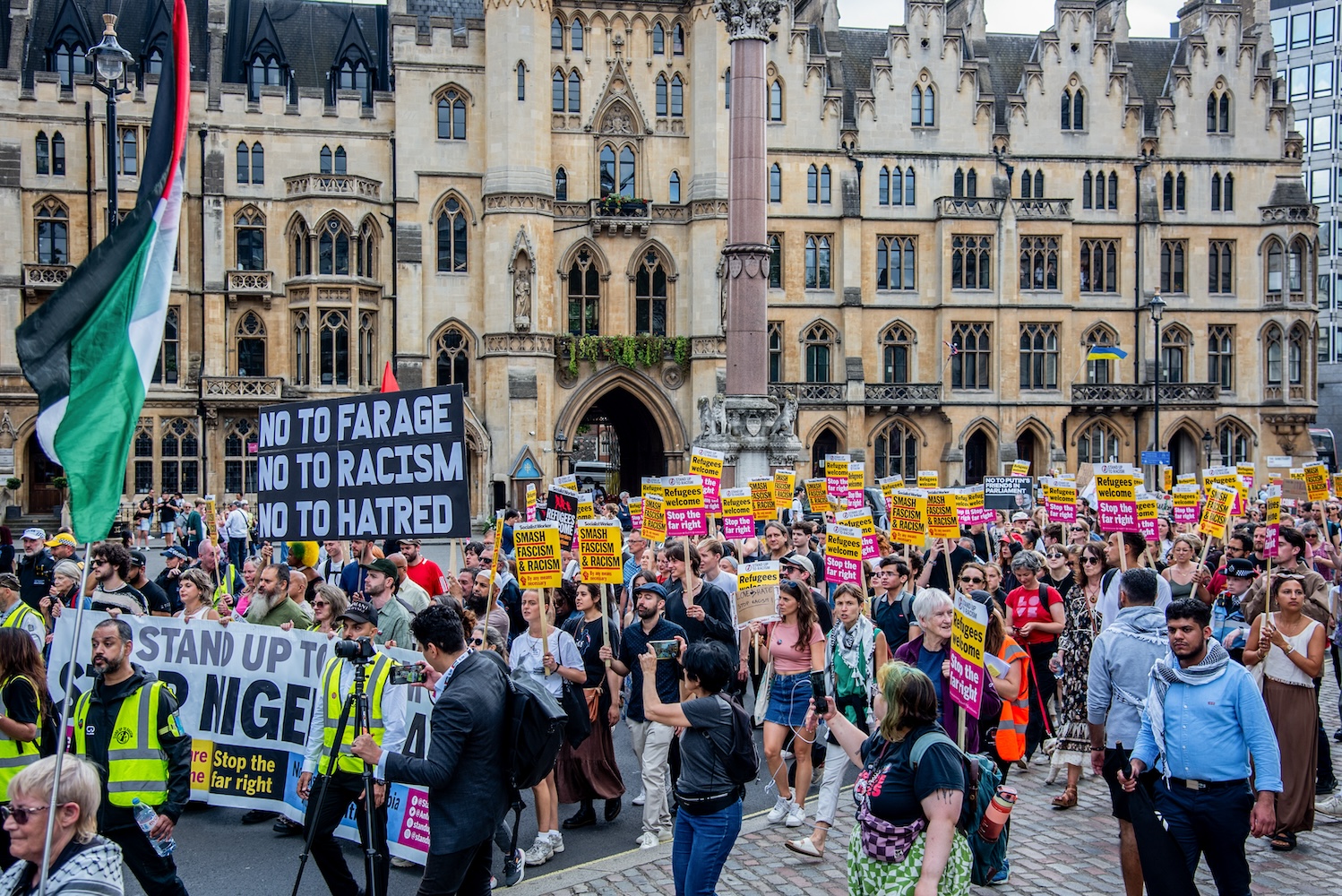 LONDON, UNITED KINGDOM - 2024/08/10: A crowd of protestors march with placards during the Stop the Far Right – National Day of Protest.