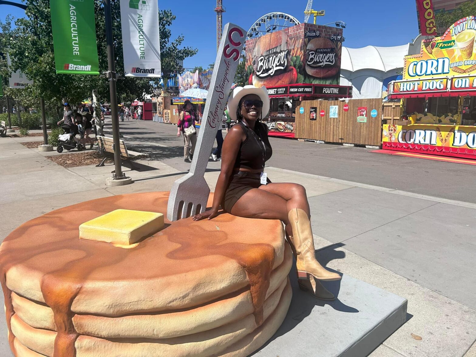 Osby sitting on a stack of pancakes at the Calgary Stampede.