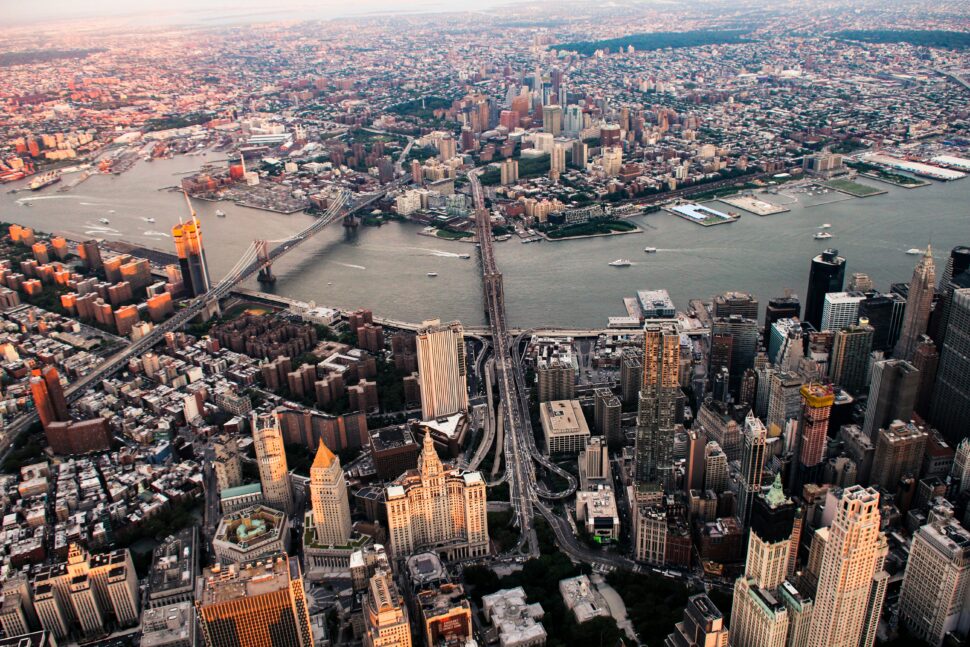 aerial view of the boroughs of New York City at sunset