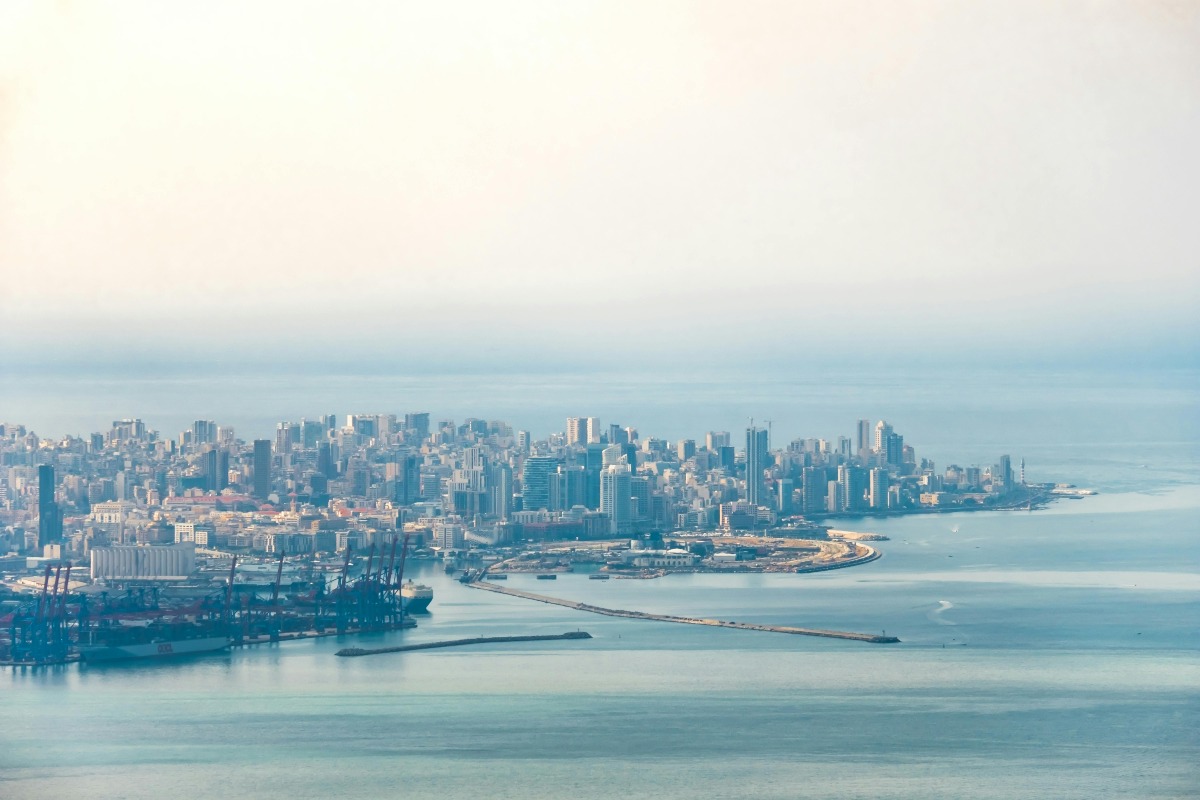 Beirut cityscape in the day light near the water.