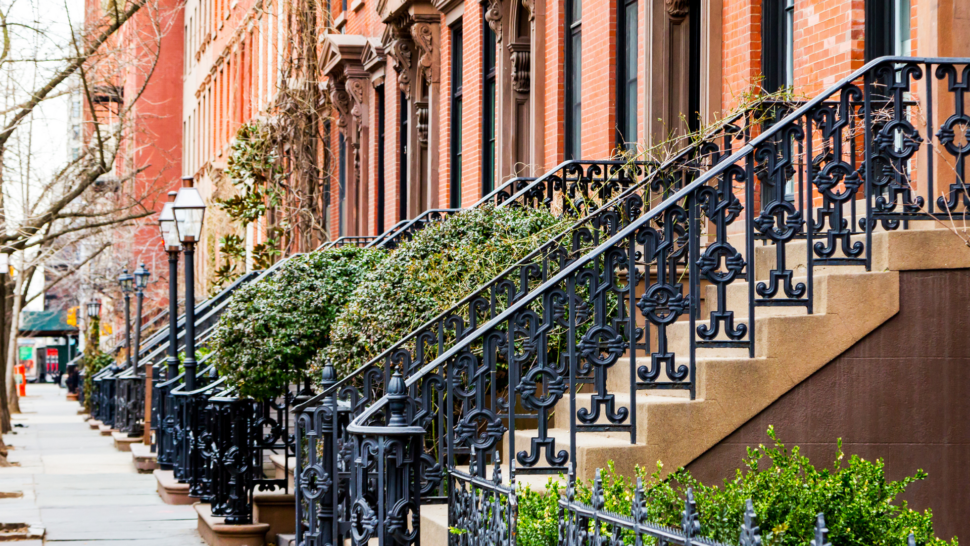 Empty Sidewalk along a street of homes in Greenwich Village in New York City