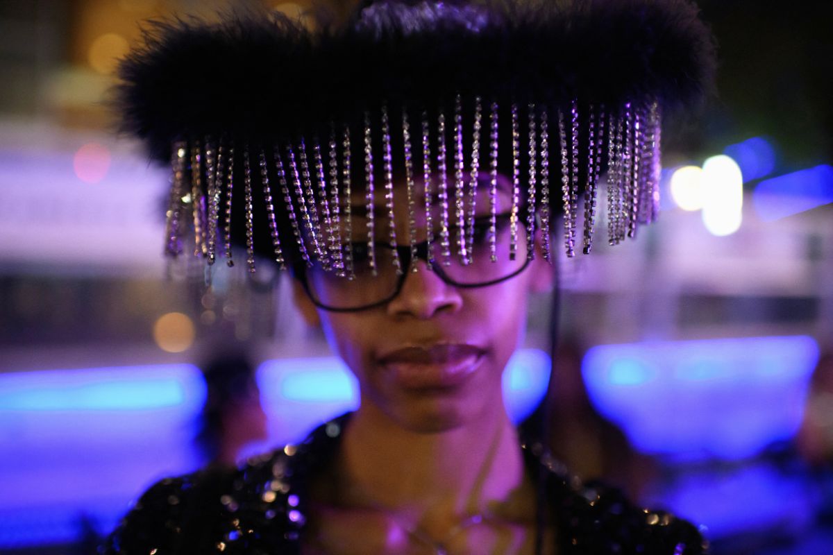 Fan wearing bedazzled cowboy hat at Beyonce themed event