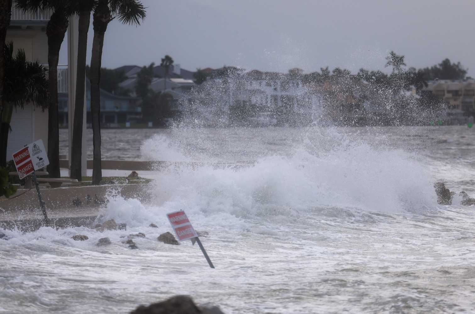 Waves from the Gulf of Mexico crash on shore as Hurricane Helene churns offshore on September 26, 2024 in St. Pete Beach, Florida.