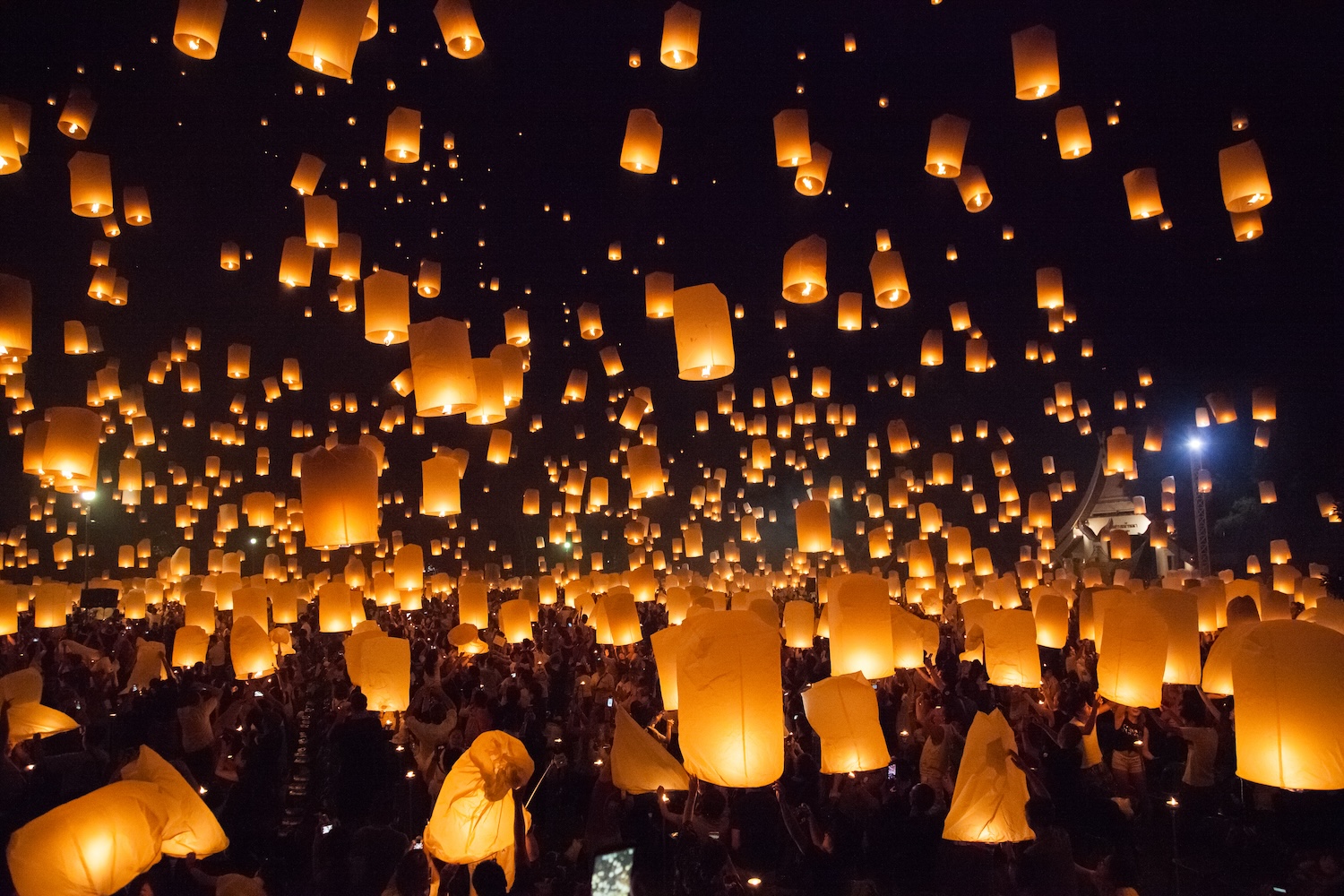 Flying sky lanterns at Loy Krathong in Thailand.