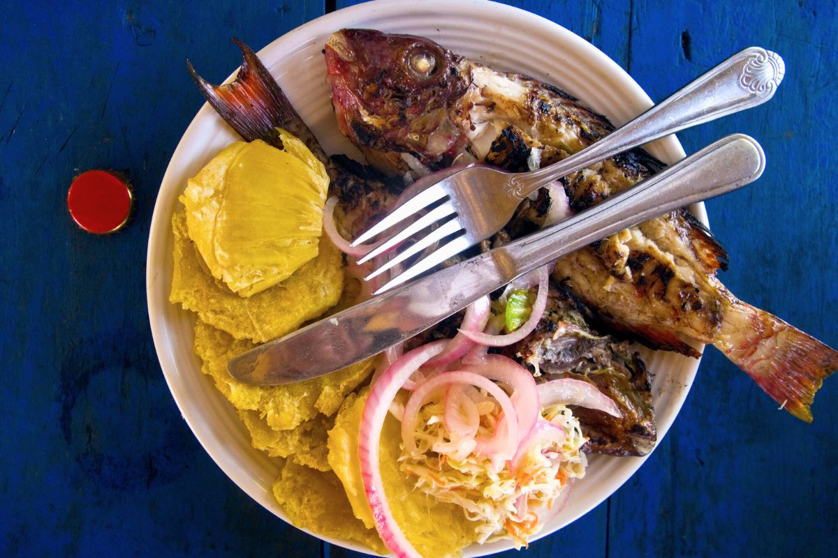 Haitian fish meal with pikliz and plantain