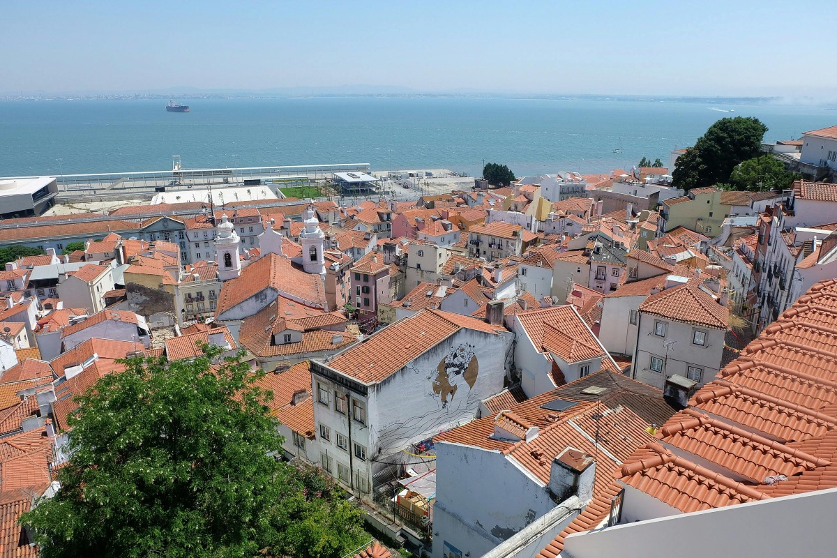 Old rooftops of residential buildings in coastal city of Portugal.