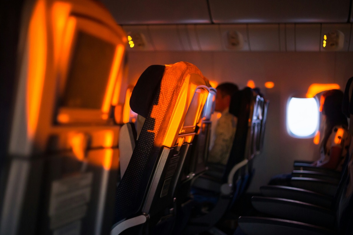 Sunset light falling on empty seats in the plane.