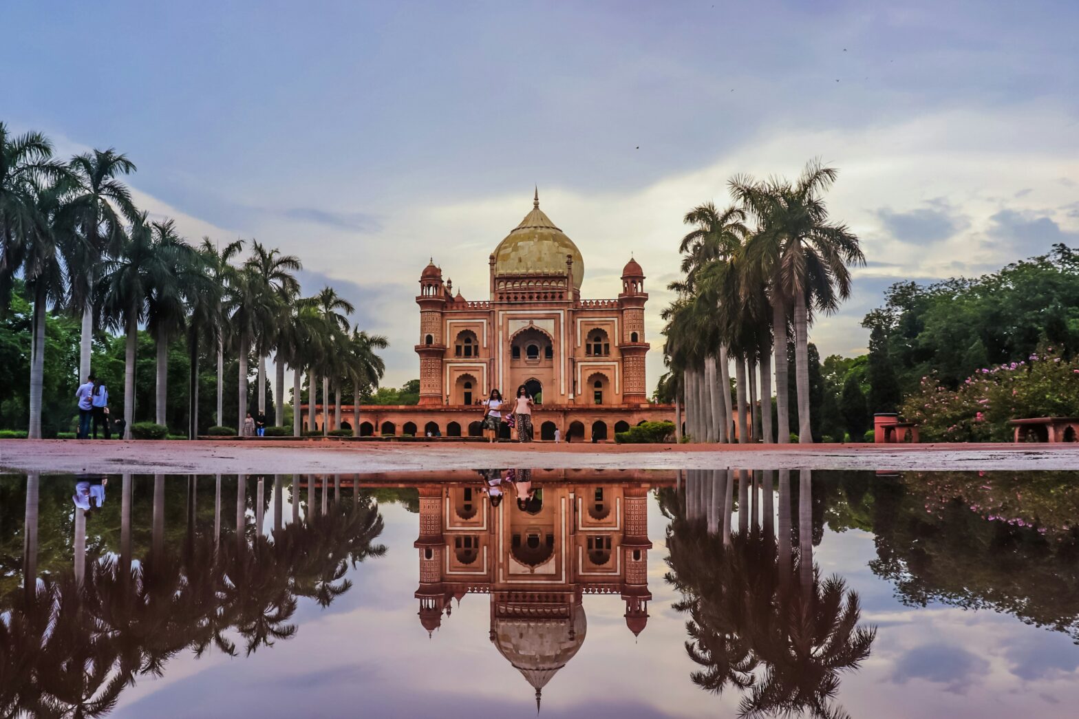 reflection of the Safdarjung Tomb in long pool in Delhi, India