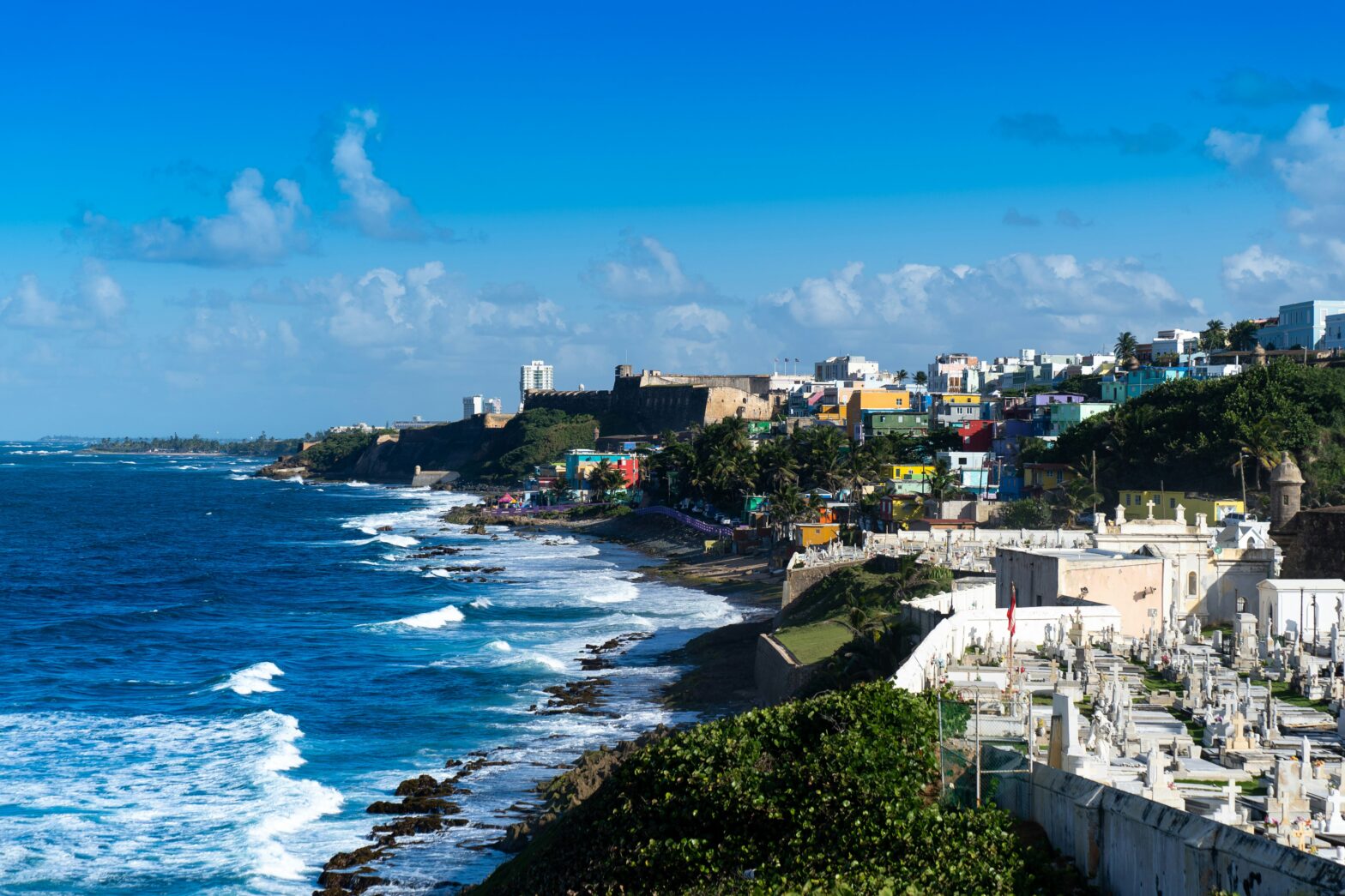 aerial shot of houses and hotels on the coastline at San Juan, Puerto Rico